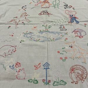 Vintage child’s embroidered bedcover or sheet